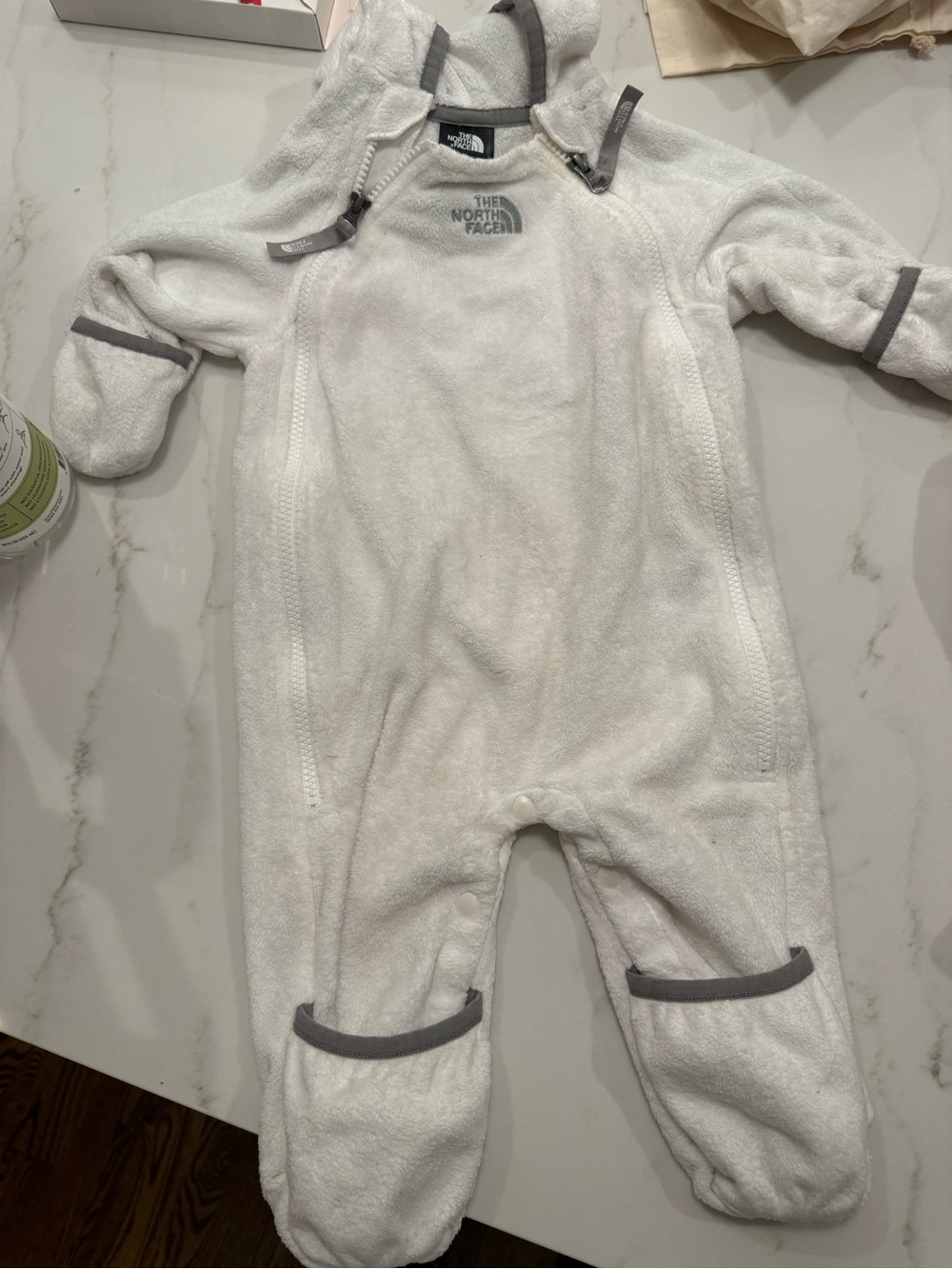 The North Face White Fleece Baby One-Piece with Gray Trim